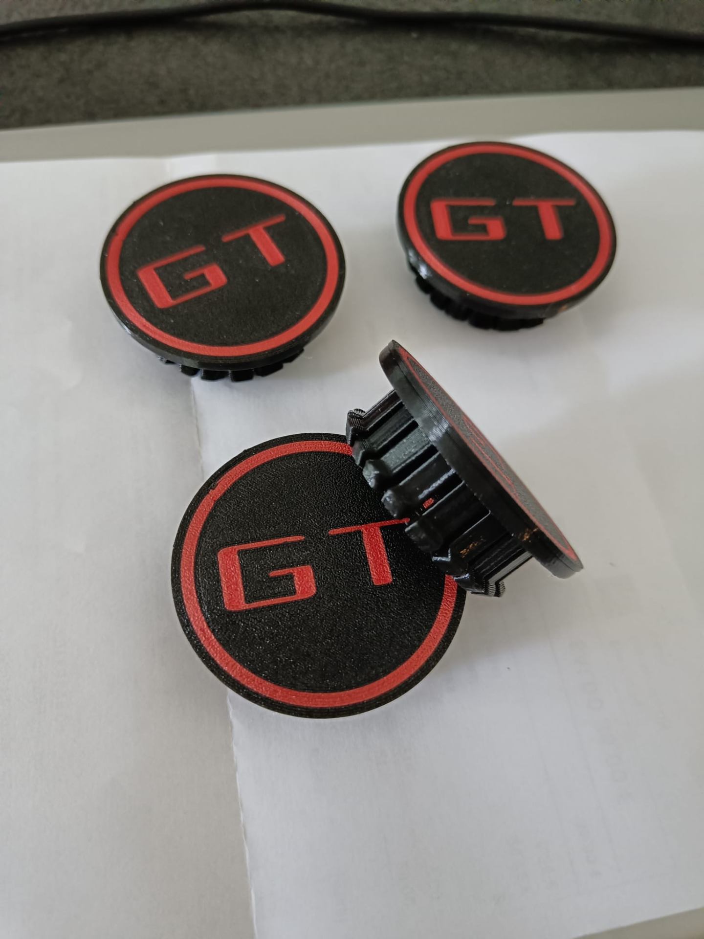 GT wheel hub caps with red ring